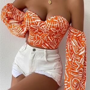 Orange Off-Shoulder Top with White Pattern
